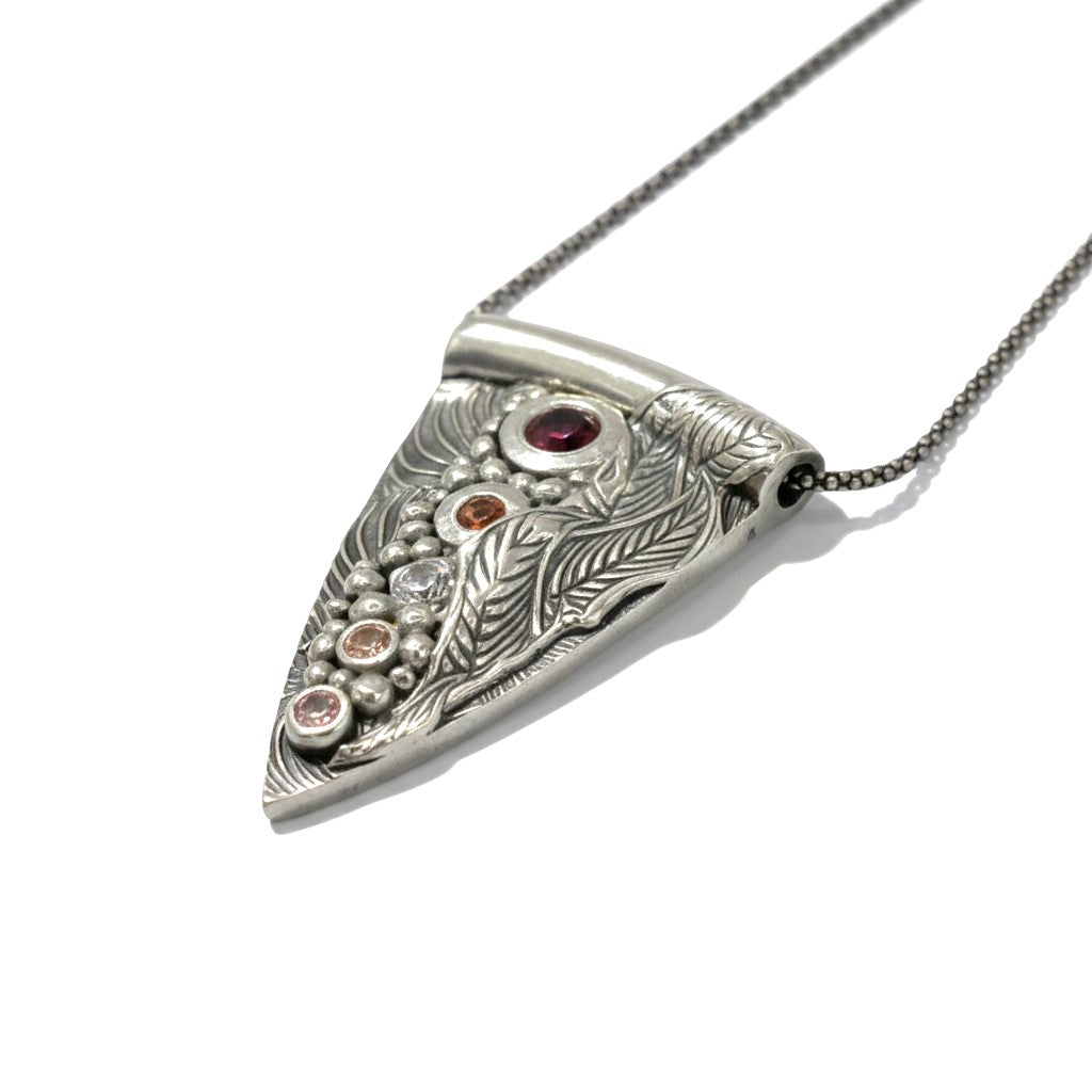 Chromatic Flow fine silver pendant worn as a necklace