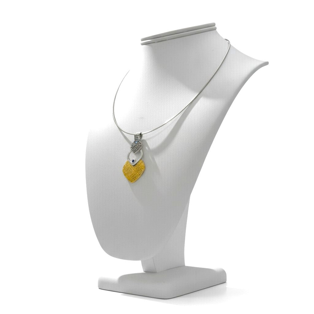 Silver Rhythm fine silver pendant worn as a necklace