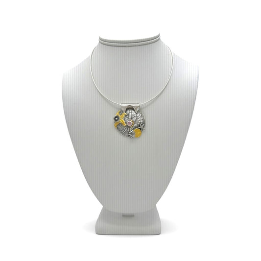 Tidal Treasures fine silver pendant displayed on a jewelry bust