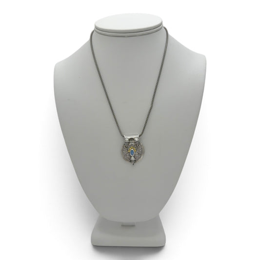Tidal Drift fine silver pendant displayed on a jewelry bust