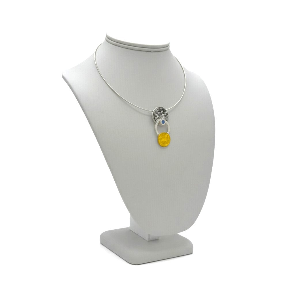 Golden Cascade fine silver pendant worn as a necklace