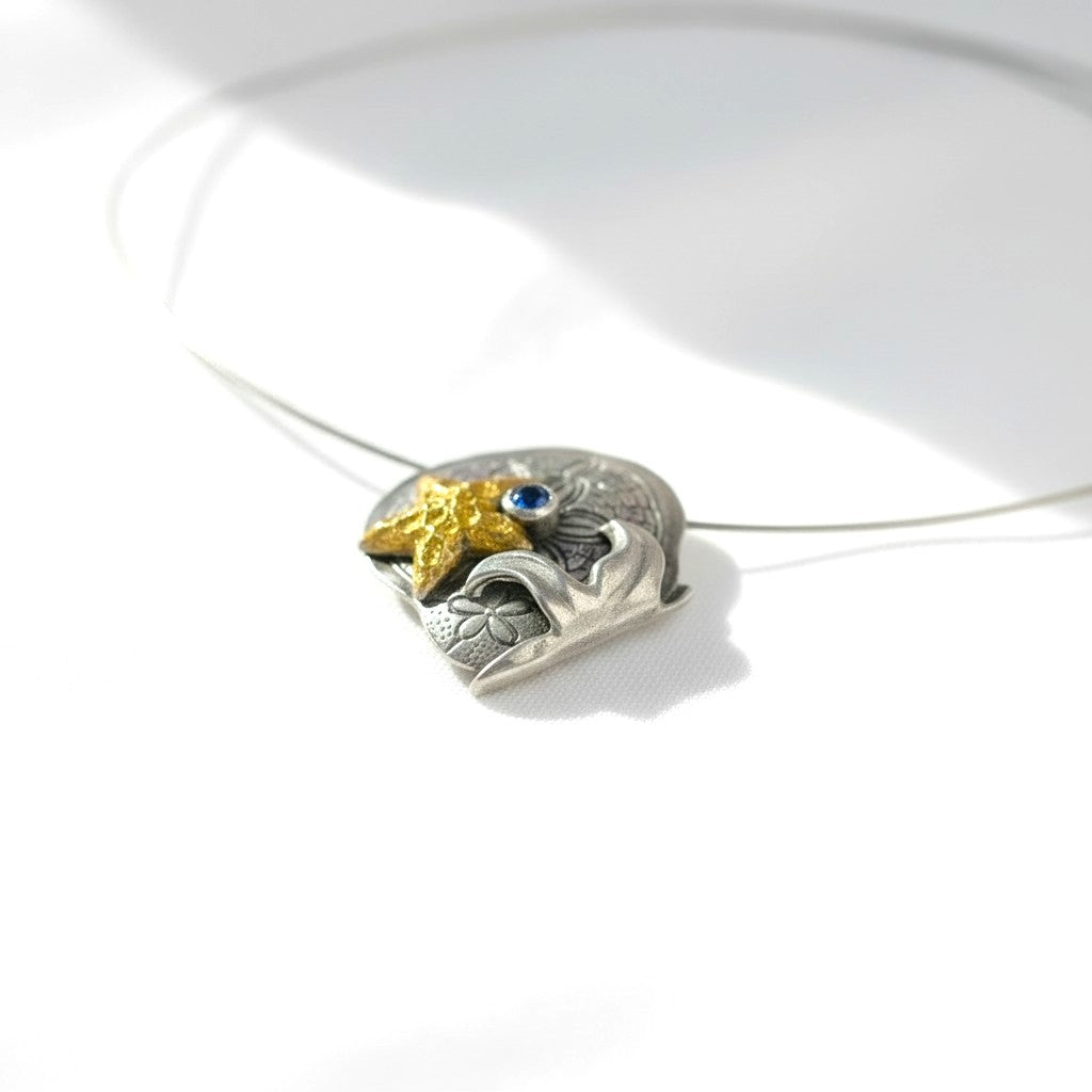 Shoreline Trio fine silver pendant worn as a necklace