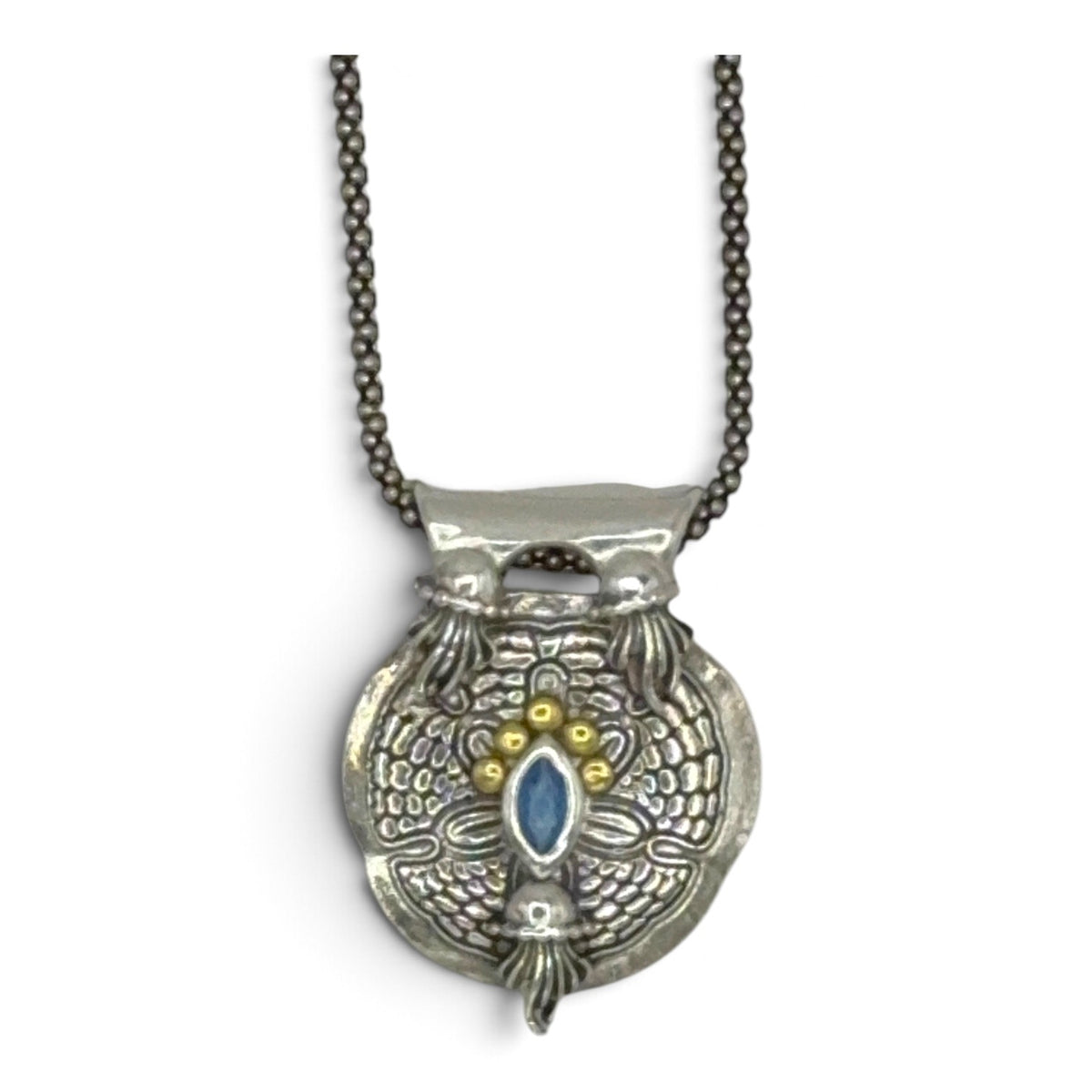Tidal Drift fine silver sand dollar pendant with jellyfish, light blue spinel and gold accents
