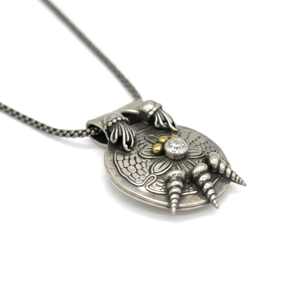 Sea Drift fine silver pendant worn as a necklace